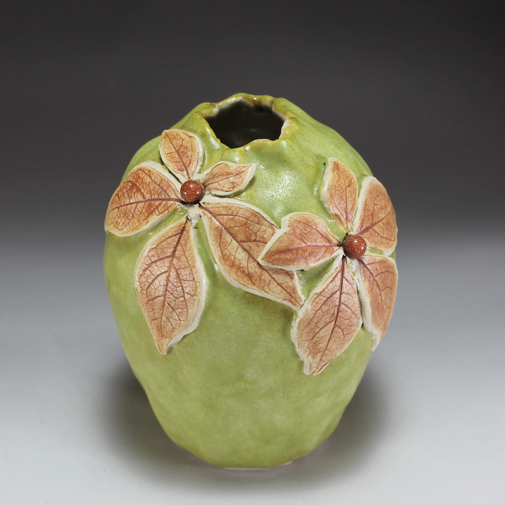 Green porcelain pinch pot w/ Virginia creeper