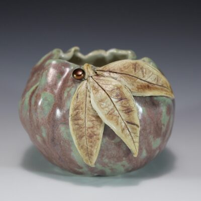 Porcelain pinch pot with leaves